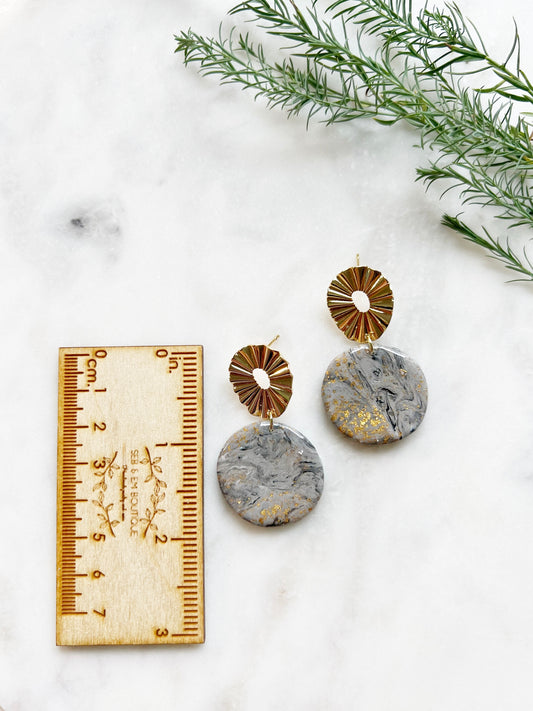 Round gray, gold and black dangles